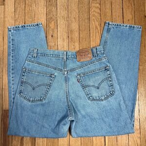 Y2K Vintage Levis 550 Jeans Relaxed Fit Light Wash Denim Black Batwing USA 33x30
